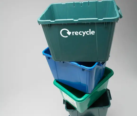Changes You Can Make Today To Help Save The Environment stacked recycling bins