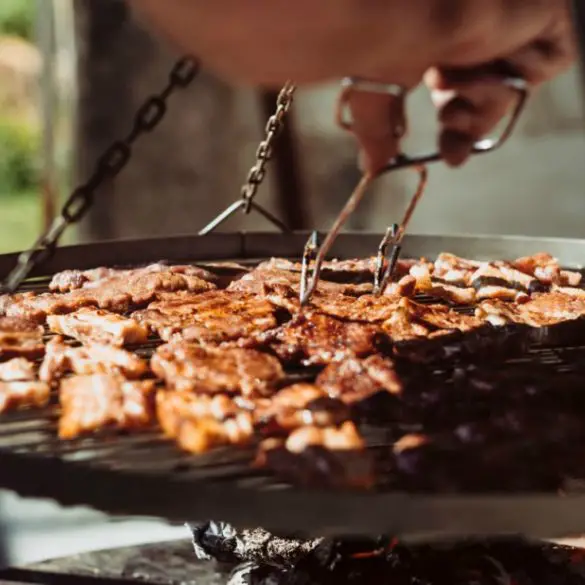 Amazing BBQ! The Secret Is In The Fermented Sauce upclose picture of meat bbq'ing on the grill