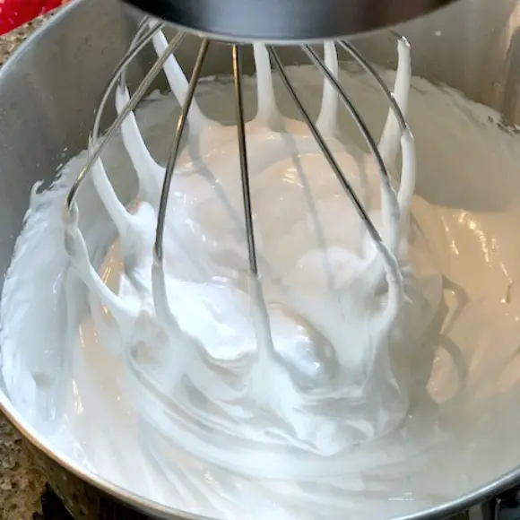 Homemade Marshmallows closeup view of whipping marshmallow mixture to stiff peaks