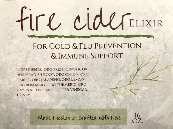 Fire Cider & It's Many Benefits close up of fire cider elixir label and it's beneficial ingredients