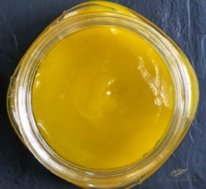 Dandelion Salve And Its Many Uses finished base recipe in mason jar