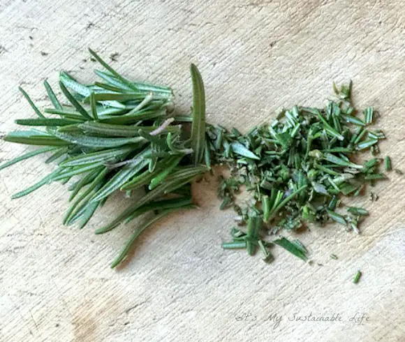 Easy Homemade Flatbread Crackers closeup image of chopped fresh rosemary