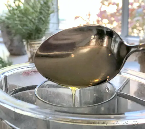 Easy Homemade Flatbread Crackers image of oil being drizzled into food processor