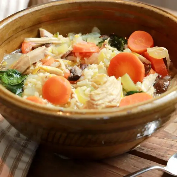 Old Fashioned Chicken Soup From Scratch in a bowl with a closeup view pictured