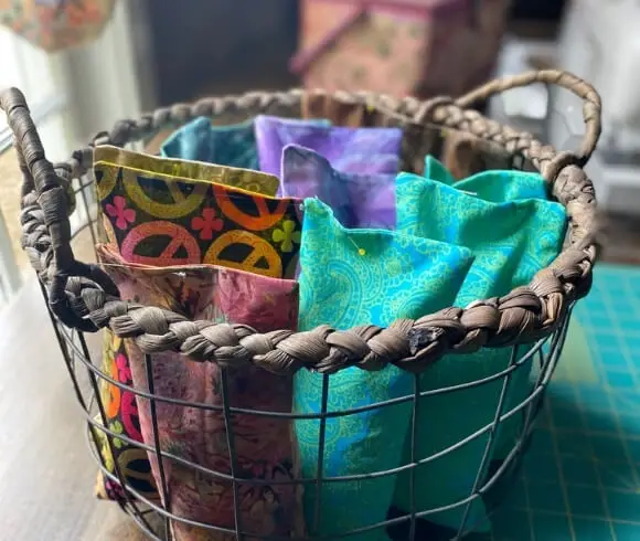 Gifts For Homesteaders image showing eye pillows in metal basket ready to be stitched