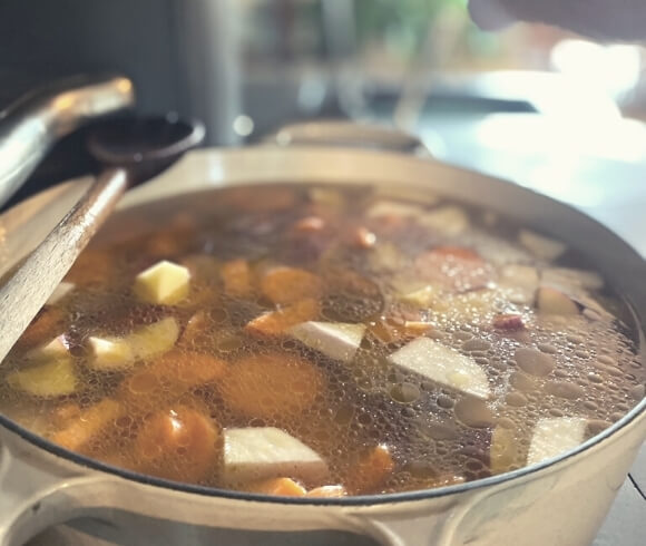 Easy Homemade Beef Stew image of cooked stew in pot on stove