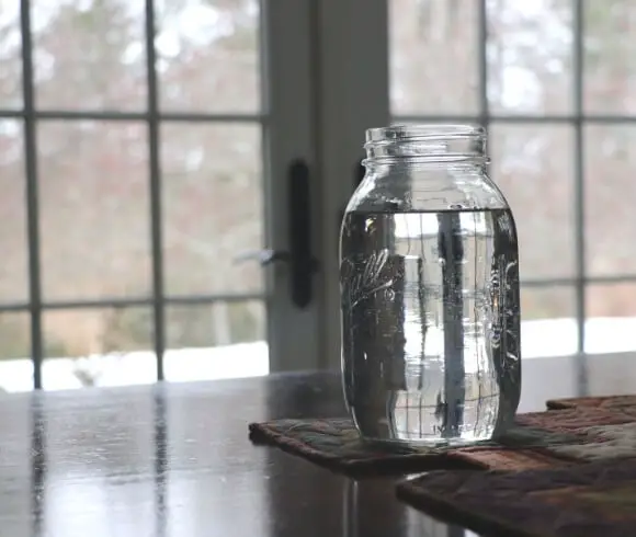How To Boost Your Immune System Naturally This Winter image of quart size mason jar filled with water on table