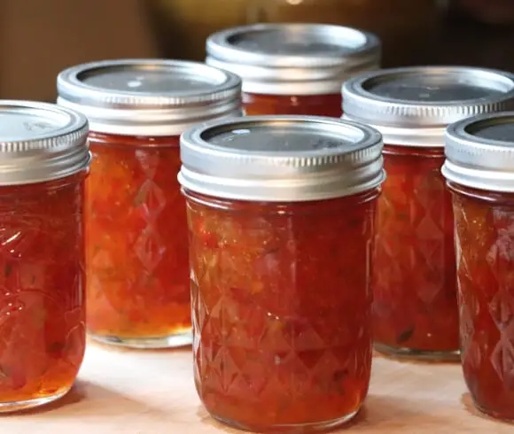 Homemade Hot Pepper Jelly image showing canned jars of homemade hot pepper jelly