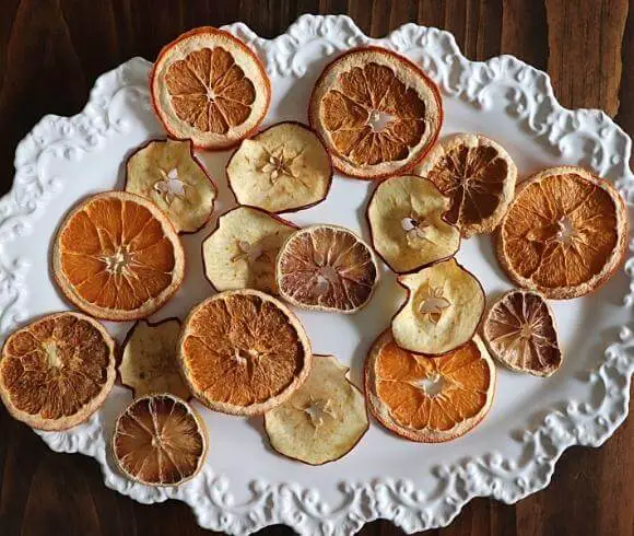 Making Dried Fruit Decorations image showing dried fruit on decorative white oblong shaped plate