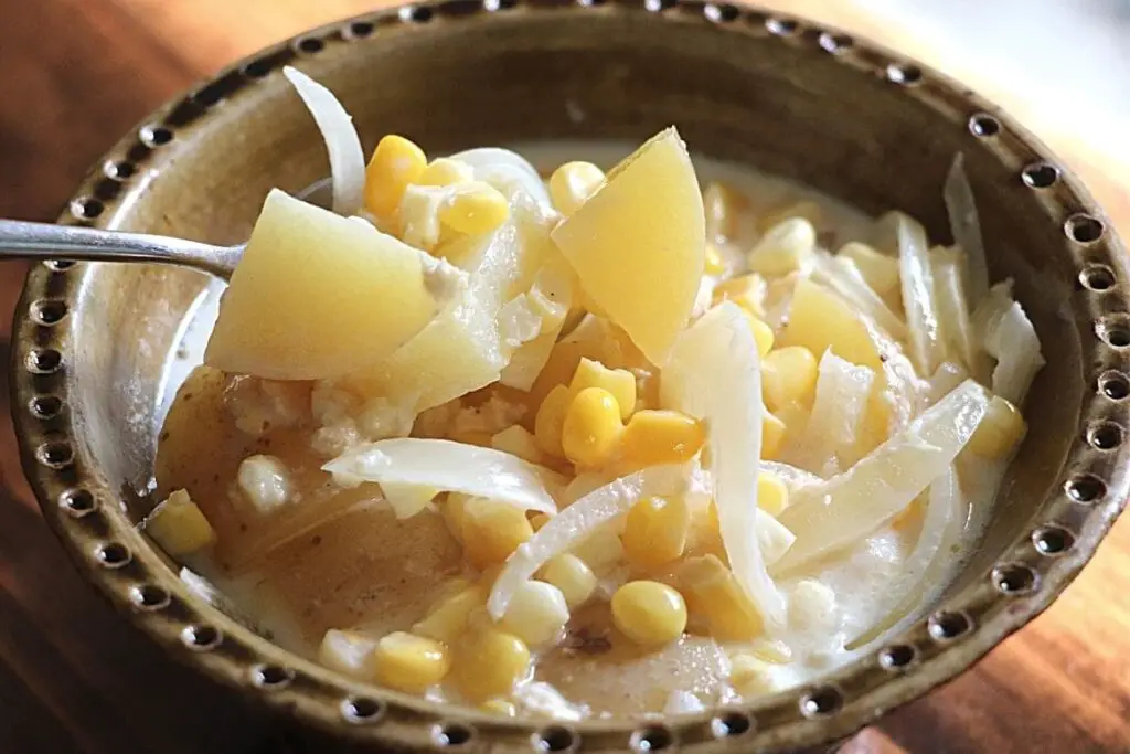 Old Fashioned Corn Chowder Recipe featured image showing green pottery bowl filled with corn chowder