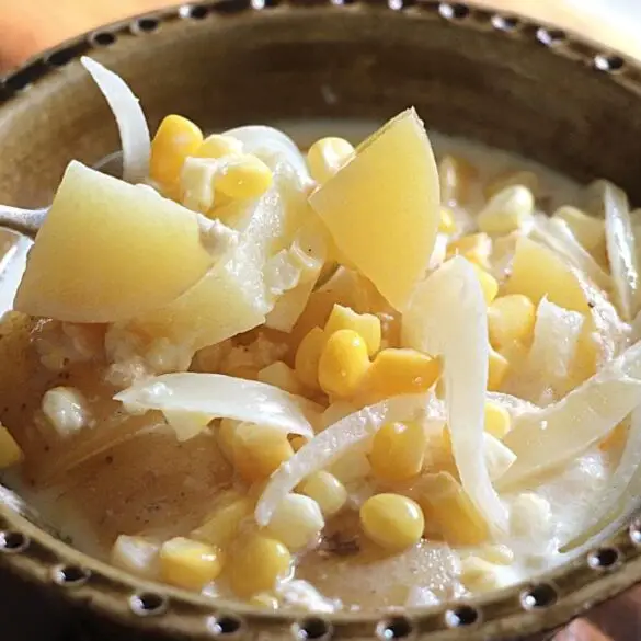 Old Fashioned Corn Chowder Recipe featured image showing green pottery bowl filled with corn chowder